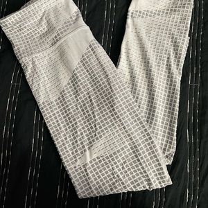 Brand new. Cool design. Comfy. Stretchy. Great for workout!